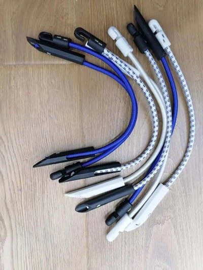 Elastic toggle tie